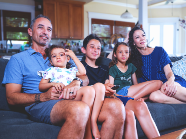 Family watching TV